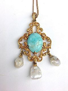 Fine Victorian yellow gold openwork brooch having oval polished turquoise center (16mm l) and 3 hang