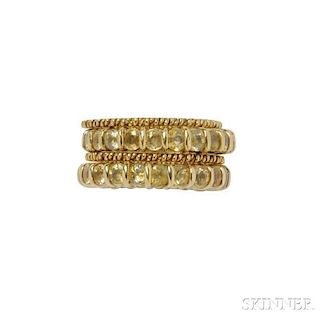Pair of 18kt Gold and Yellow Sapphire Eternity Bands