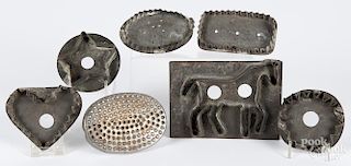 Seven tinned sheet iron cookie cutters, 19th c., to include a horse, a heart, a star, etc.