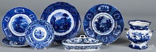 Five flow blue plates, together with a covered dish and sugar (lacking lid).