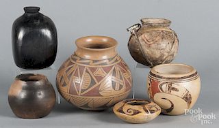 Six pieces of Native American pottery, the largest signed Manuel Sandoval Reyes, 6'' h.