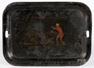 Painted tole tray, 19th c., depicting a hunter firing a gun, 20 1/2'' l., 28'' w.
