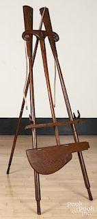 Folk art nautical easel, constructed with oars, a boat hook, oar locks, and a rudder, 70'' h.