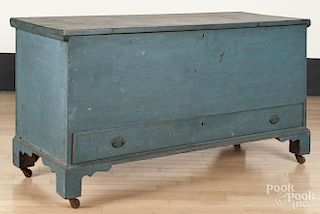 Painted white and hard pine blanket chest, ca. 1800, retaining its original blue surface, 27 1/2'' h.