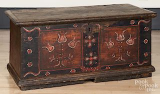 Painted pine dower chest, early 19th c., retaining its original tulip decoration, 22'' h., 44'' w.