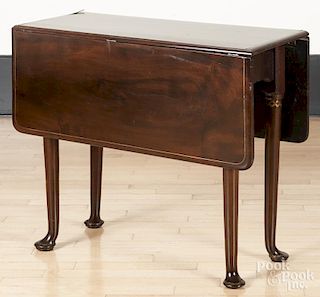 George II mahogany drop leaf table, ca. 1760, with brass inlaid bands at the top of the legs, 28'' h.