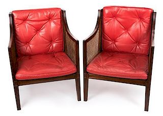A Pair of Regency Style Mahogany Armchairs Height 33 inches.