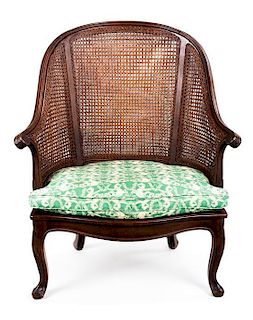 A Louis XV Style Stained Beechwood Bergère Height 42 inches.