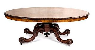 A Victorian Satinwood-Inlaid Burr Walnut Low Table Height 19 x width 54 x depth 40 inches.