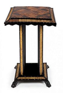 An Anglo-Indian Ebony, Quillwork and Specimen Wood Occasional Table Height 25 x width 16 depth 16 inches.