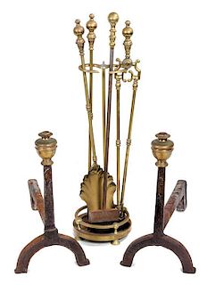 A Pair of Georgian Style Brass Andirons Height of tallest 19 inches.