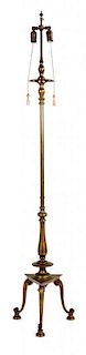 A Georgian Style Brass Patinated Metal Standing Lamp Height 48 inches.