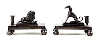 A Pair of Continental Bronze Candle Holders Height 3 3/4 x width 5 3/8 inches.
