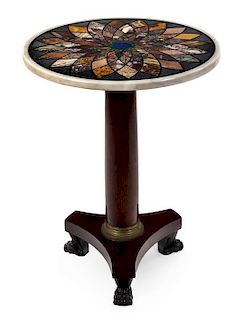A Regency Rosewood and Specimen Marble Center Table Height 28 3/4 x diameter 34 inches.