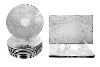 Eighteen Silver-plate Engraved Placemats Diameter 11 3/8 inches.