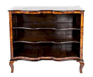 A Pair of Italian Rococo Style Walnut Bookcases Height 40 x width 44 x depth 13 3/4 inches.