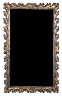 An Italian Giltwood Mirror 61 x 37 inches.