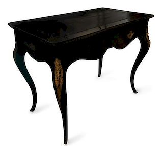 A Louis XV Style Ebonized and Gilt Metal Mounted Bureau Plat Height 29 x width 35 3/4 x depth 21 inches.