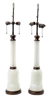 A Pair of Opaline Glass Oil Lamps Height 22 1/4 inches.