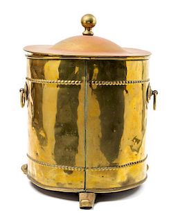 An English Brass Footed Bucket Height 16 1/2 inches.