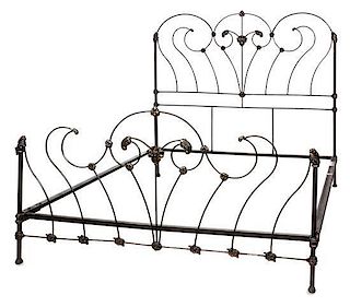 A Victorian Cast-Iron Full-Sized Bedstead Height 71 x width 80 inches.