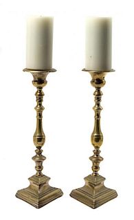 A Pair of North European Brass Candlesticks Height 15 1/4 inches.