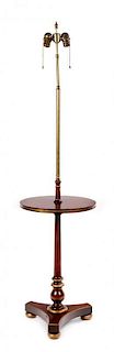 A Regency Style Brass-Mounted Mahogany Lamp Table Height 57 inches.