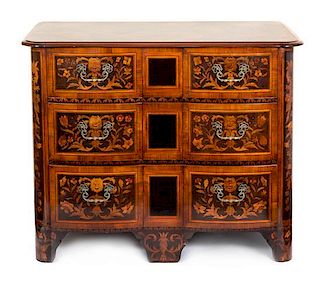 A Pair of Italian Baroque Ebonized and Marquetry Commodes Height 35 1/2 x width 42 x depth 22 inches.