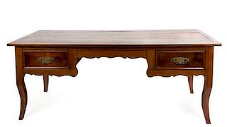 A French Provincial Fruitwood Writing Table Height 30 x width 70 x depth 28 1/2 inches.