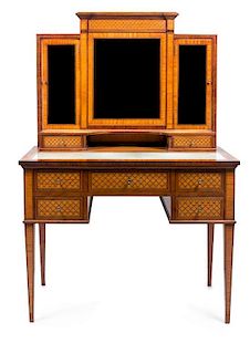 An Edwardian Satinwood and Mahogany Dressing Table Height 65 x width 43 x depth 23 inches.