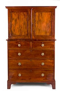 A Late Regency Mahogany Cabinet-on-Chest Height 68 1/2 x width 41 x depth 22 1/4 inches.