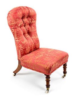 A Victorian Walnut Slipper Chair Height 39 inches.