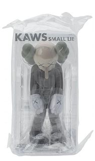 KAWS (American, b.1974) Small Lie (Brown). 11 x 5 x 4.5 In / 27.9 x 12.7 x 11.4 cm
