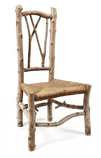 A Twig and Rush Seat Child's Chair Height 28 inches.