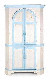 A George III Style Blue and Cream Painted Corner Cabinet Height 82 x width 34 1/4 x depth 34 1/4 inches.