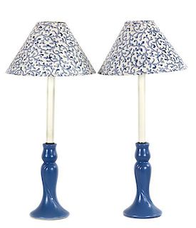 A Pair of Blue-Painted Bedside Table Lamps Height 26 inches.