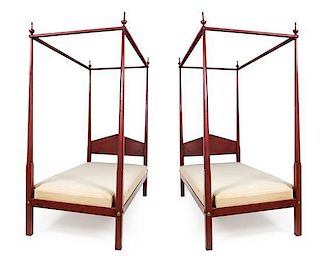 A Pair of Red-Painted George III Style Single Four-Poster Beds Height 82 inches.