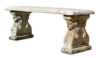 A Baroque-Style Stone Composite Bench Height 20 x width 53 x depth 17 inches.