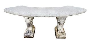 A Baroque-Style Stone Composite Bench Height 22 x width 70 x depth 29 inches.
