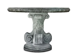 A Soapstone Composite Center Table Height 30 x diameter 42 1/2 inches.