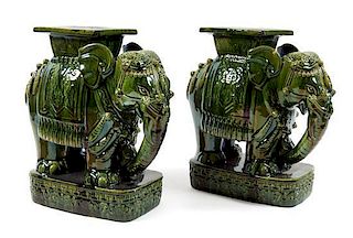 A Pair of Glazed Terracotta Elephant Garden Stools Height 23 inches.