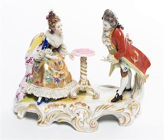 * A Dresden Porcelain Figural Group Height 6 inches.