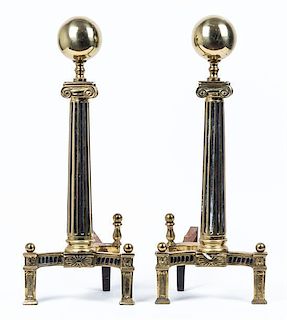 * A Pair of Brass Andirons Height 24 inches.