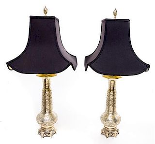 A Pair of Silvered Metal Lamps Height overall 29 1/2 inches.