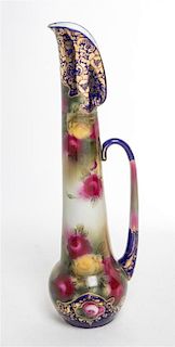 * A Continental Porcelain Ewer Height 21 3/4 inches.