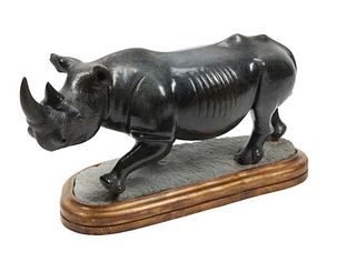 A Large Carved Black Marble Figure of A Rhinoceros on Giltwood Base