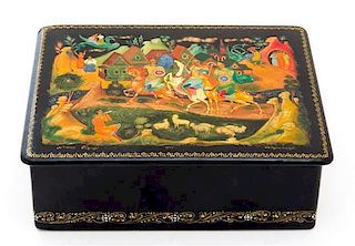 A Russian Lacquered Box Height 1 5/8 x width 5 1/8 x depth 4 1/8 inches.