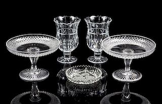 A Pair of Glass Compotes Height 5 1/4 x diameter 8 inches.