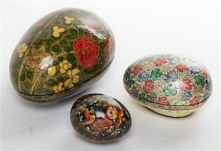Three Lacquered Eggs Length of largest 5 3/8 inches.