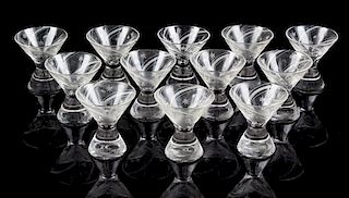 Twelve Etched Glass Dessert Cups Height 3 1/4 inches.